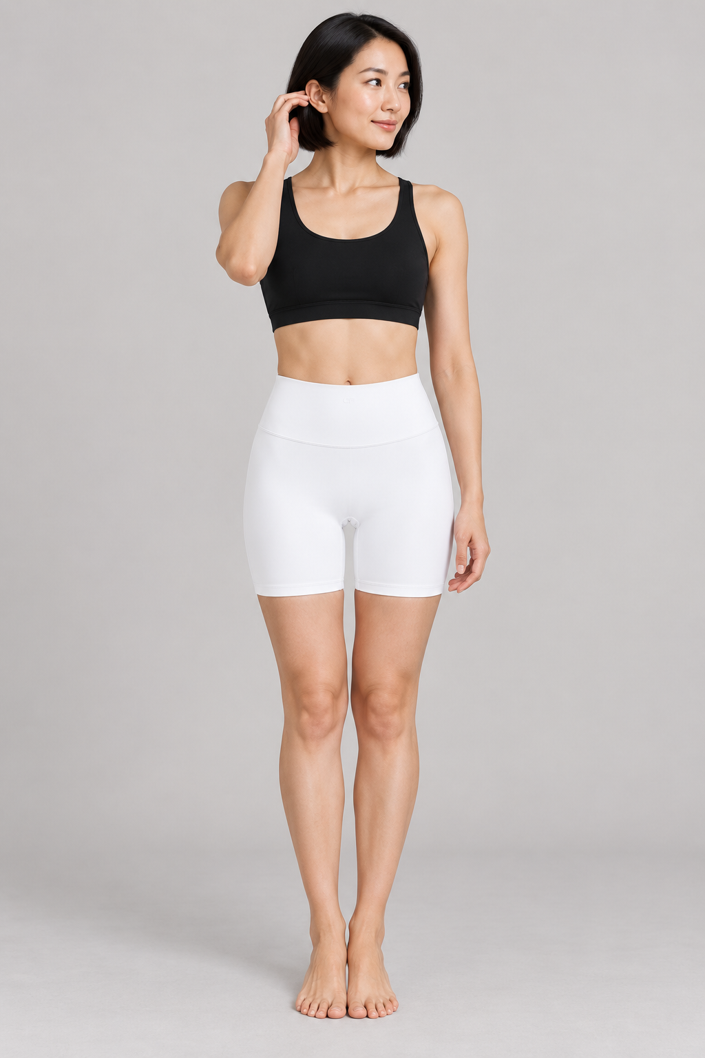 Women’s High Waisted Yoga Biker Shorts - White - front on model