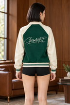 CRAMPFIT Raglan Varsity Jacket in green and cream, back view with signature logo