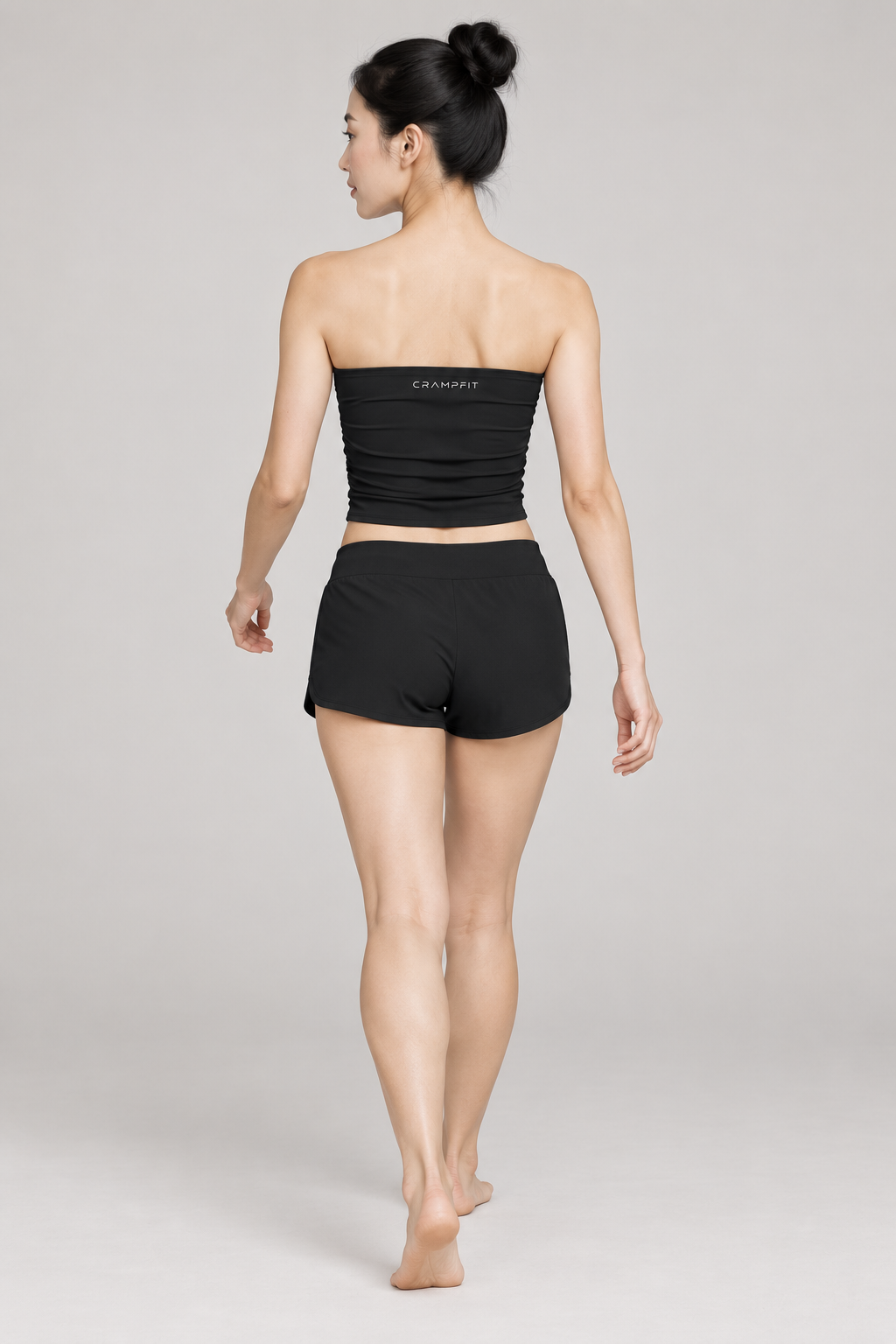 Women’s Ruched Cropped Yoga Tube Top - Black - back on model