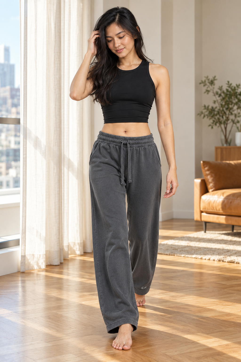 CRAMPFIT women's dark gray cotton sweatpants, front walking view with wide straight legs.