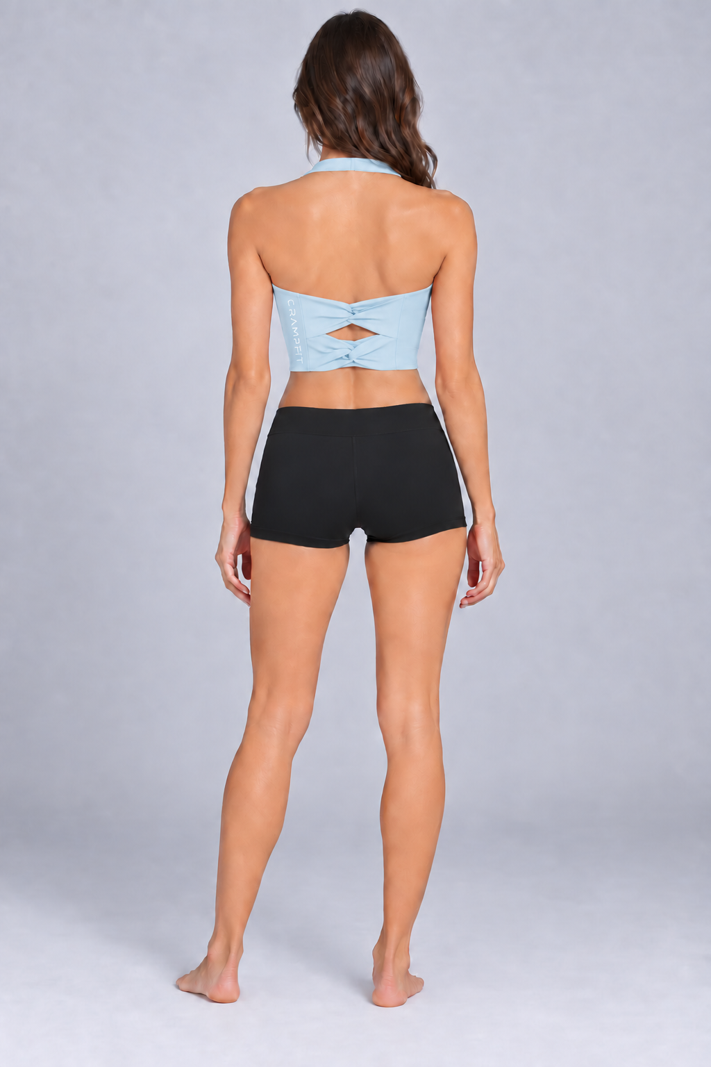 Women's Halter Yoga Sports Bra Light Blue - back view on barefoot model