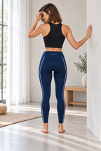 CRAMPFIT women's navy blue Sculpt Legging, full-body rear view showing waistband and white contour piping, styled with a black crop tank.